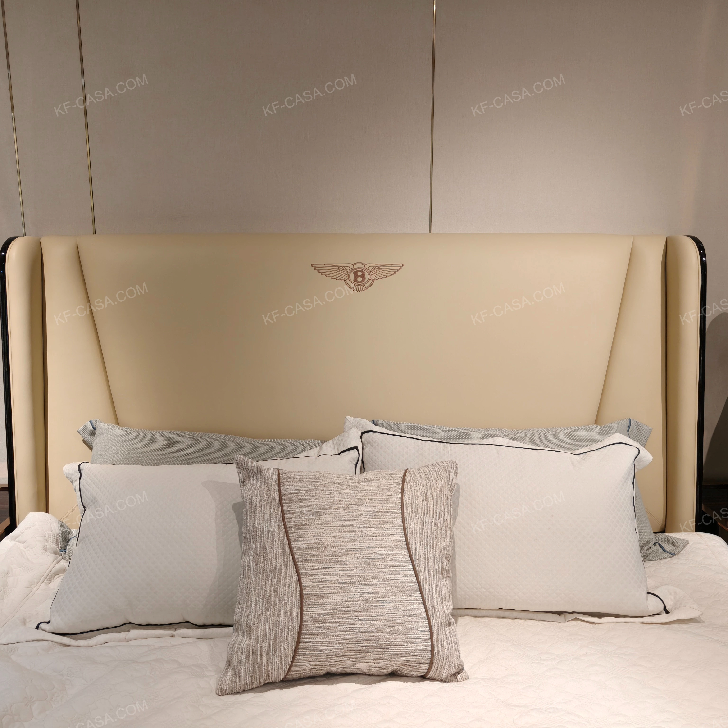 Cream Leather Upholstered Bed with Dark Natural Wood Veneer Trim, Embossed Brand Emblem & Copper-Accented Hardware